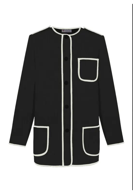 Nuestra chaqueta Kaiku en pana negra: tradición vasca, diseño contemporáneo y sostenibilidad en una pieza única.